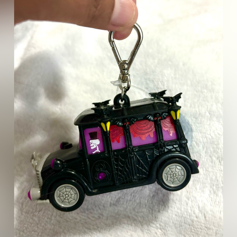 Bath & Body Works hand sanitizer holder. Light up, musical hearse.